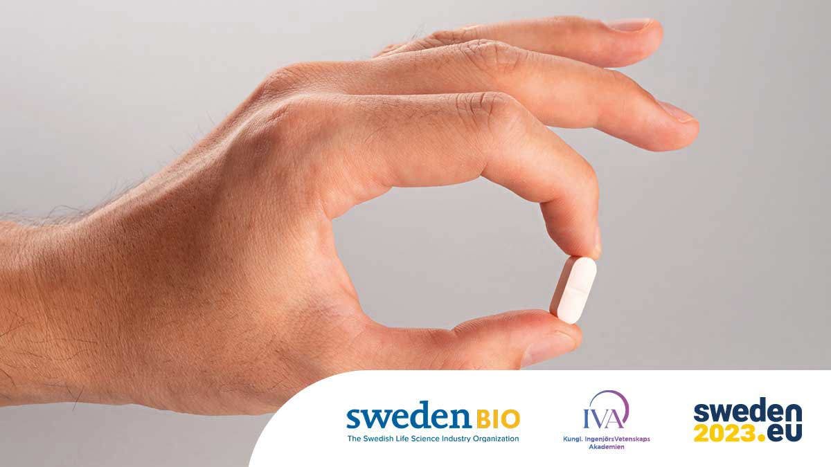 Hand som håller ett piller