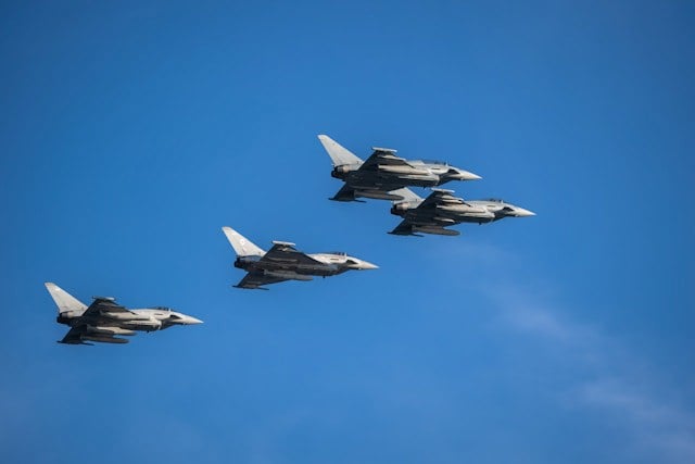 fighter planes in the sky