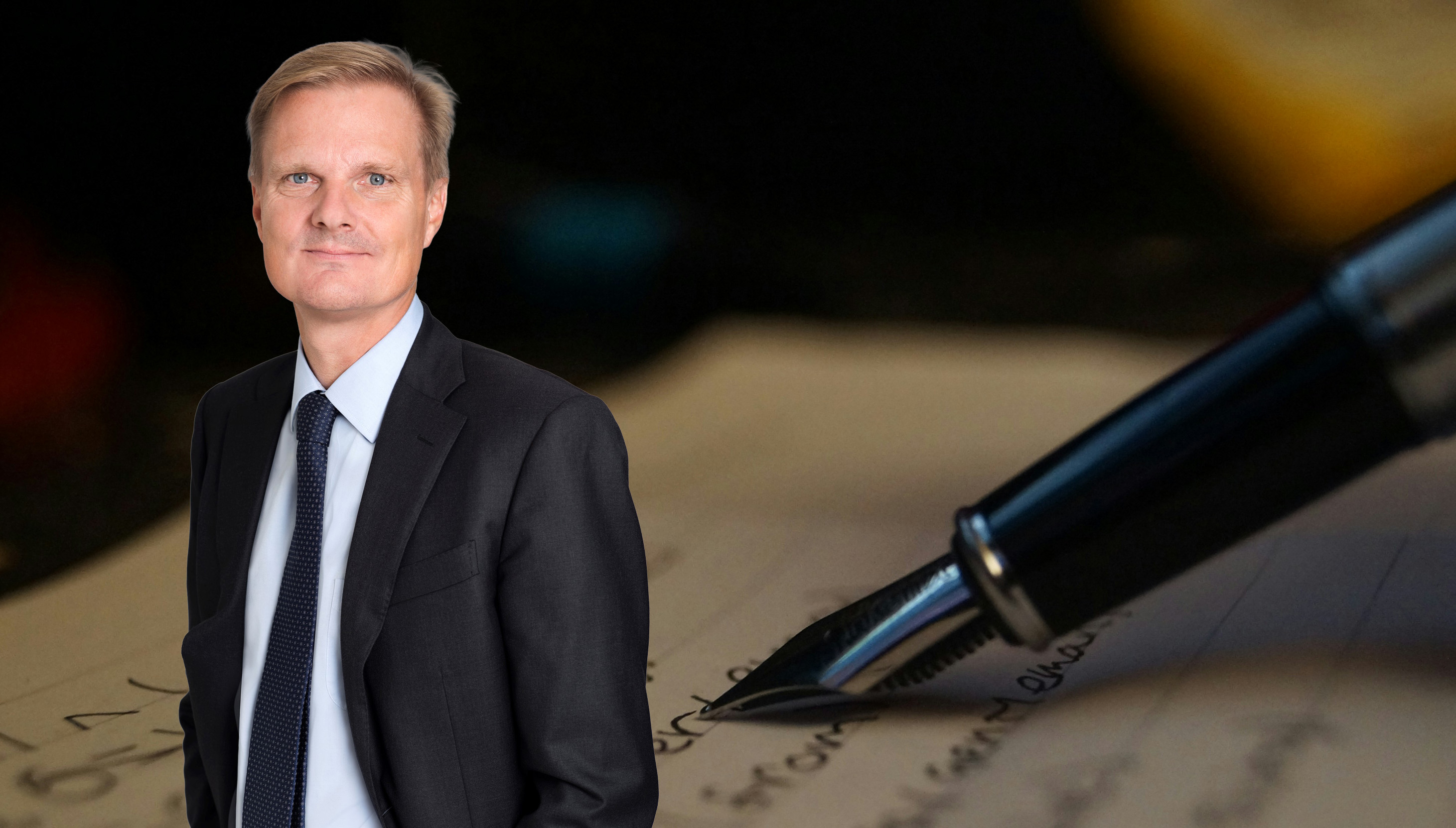 penna och papper med skrift