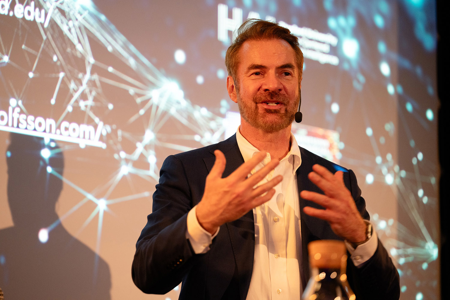 Close-up: Erik Brynjolfsson in stage light