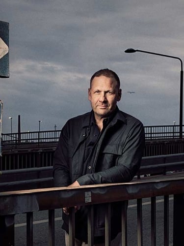 Lasse Wierup i centrala Stockholm med Stadshuset i bakgrunden.